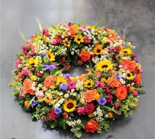 Image - Begrafeniskrans rond en kleurrijk