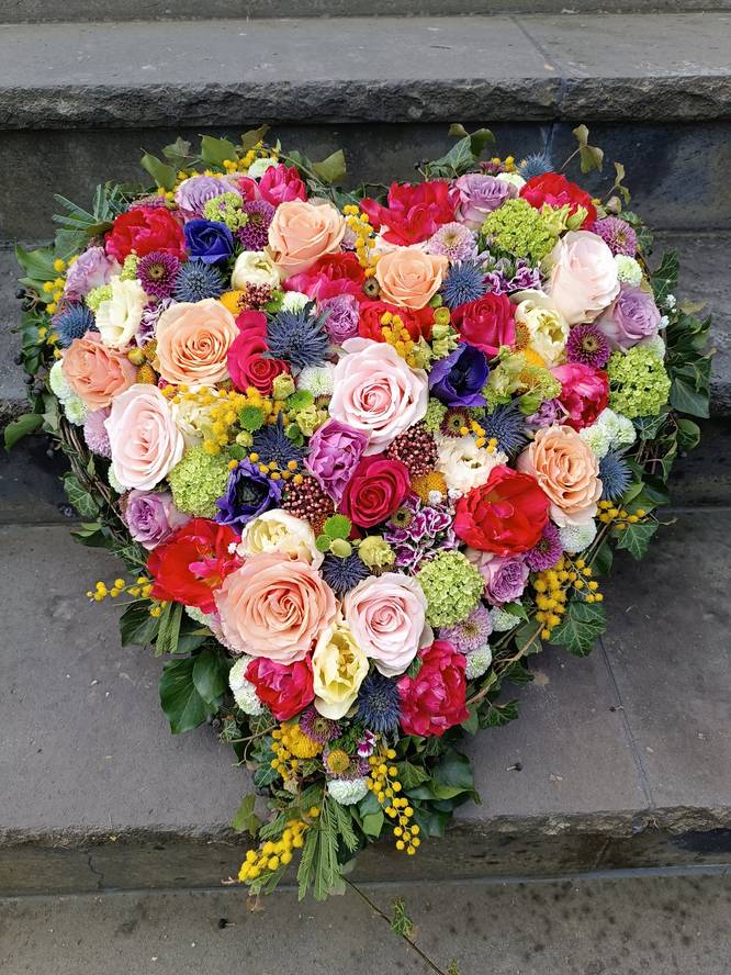 Image - Lichtgevend hart rouwarrangement