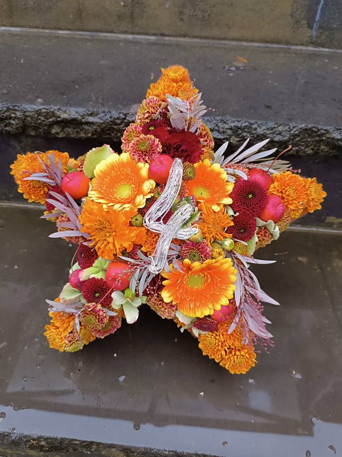 Begrafenis arrangement ster